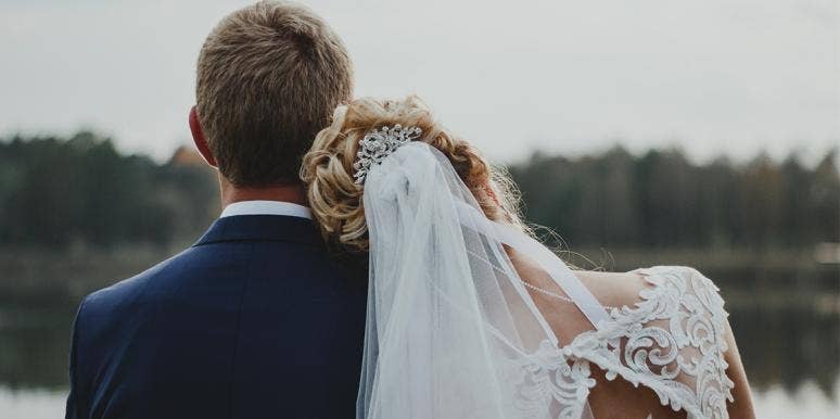 I Didn't Love My Wife When We Got Married bride and groom facing away