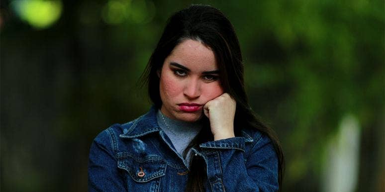 What To Do When You Feel Disgust Toward Other People woman making a disgusted face