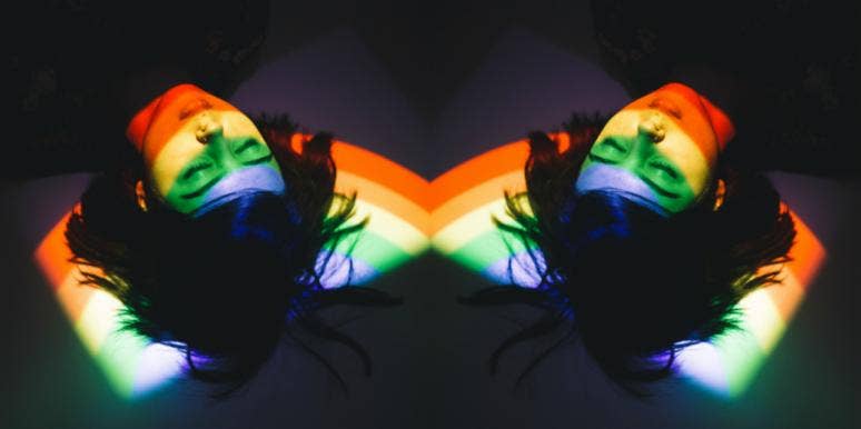 24 Divorce Recovery Myths & 5 Ways To Help You Cope And Heal woman laying on floor with rainbow reflection on her face