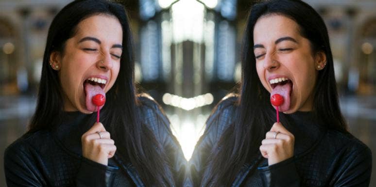 What Women Do (And Do Not) Like About Giving Blowjobs woman with lollipop in her mouth