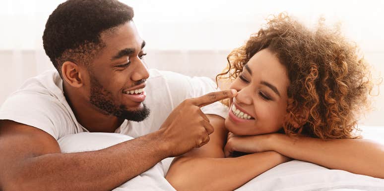 4 Relationship Rules The Longest-Lasting Couples Follow couple playing in bed
