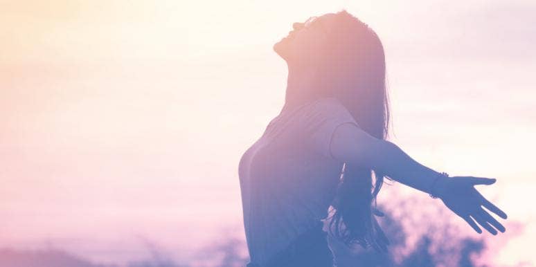 You Can Be Nostalgic Of Old Times, But Don't Live In The Past woman with arms stretched out in the wind freedom liberation