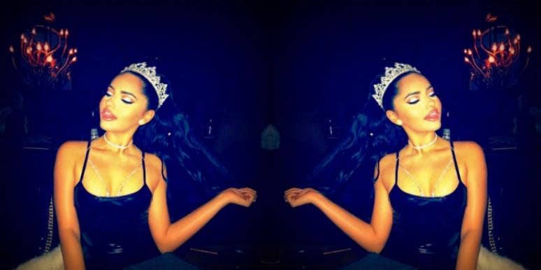 Woman wearing a crown confidently Woman wearing a crown confidently