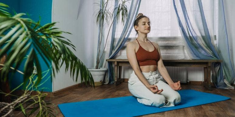 energy clearing woman meditating