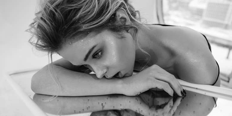 Everything Happens For A Reason: Why Our Past Shapes Us, But Doesn’t Define Us woman laying on table
