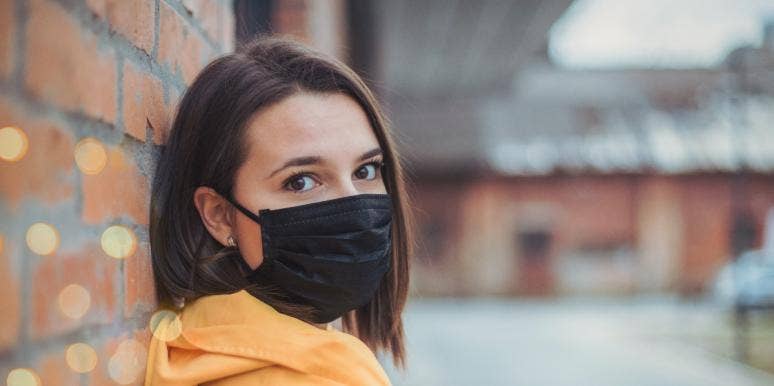 Why Eye Contact Is So Important In The Age Of The Mask woman wearing mask outside
