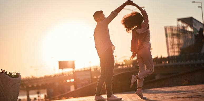 Why Sometimes Fairy Tales Are Better Without A Happy Ending couple dancing in sunlight