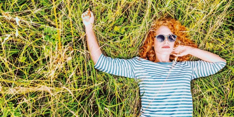fall in love with a mindfulness practice woman lying on the grass