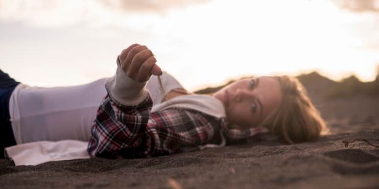 The Truth Behind Falling For The Guy You Know You Shouldn’t woman on the ground