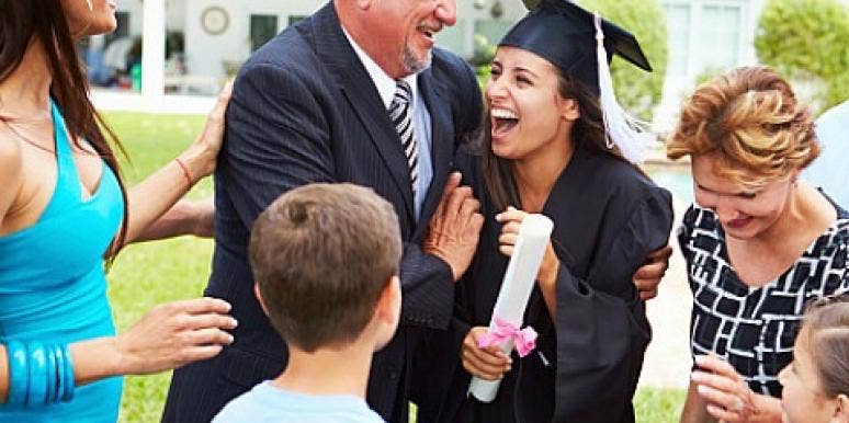 family celebrates woman's graduation family celebrates woman's graduation
