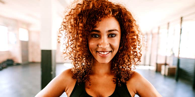 Fear of change Woman in gym ready to embrace change