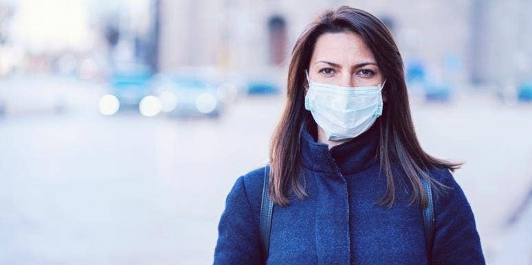 fear of death woman wearing a mask