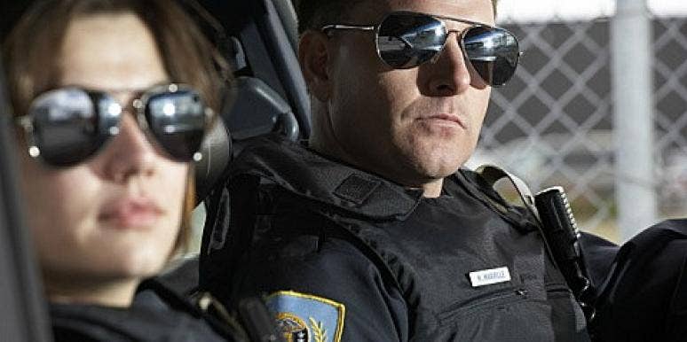 female and male cop in cop car female and male cop in cop car