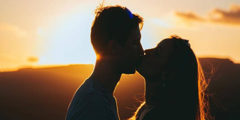 kissing at sunset 