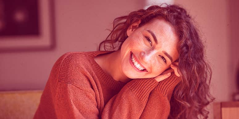 5 Ways To Be 10X Happier With Your Life, According To Science lady smiling