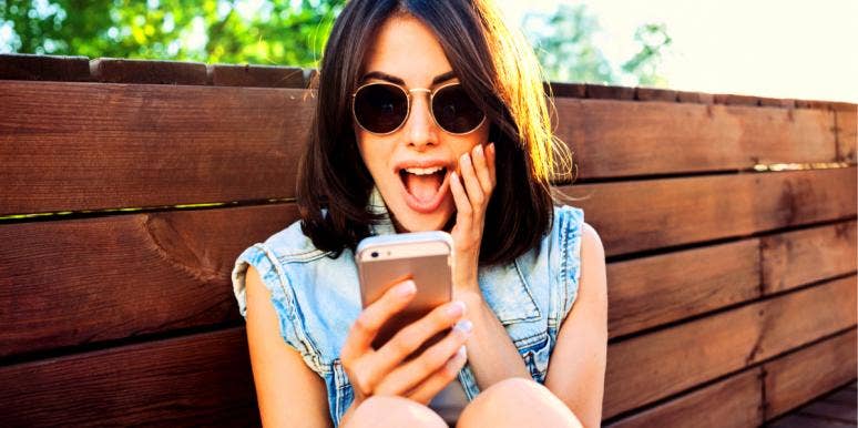 woman texting flirty emoji