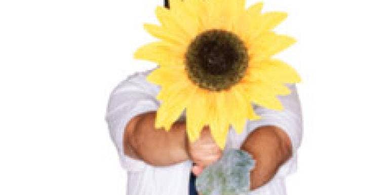 Women Like Men Who Send Flowers, Right?? man holding giant sunflower