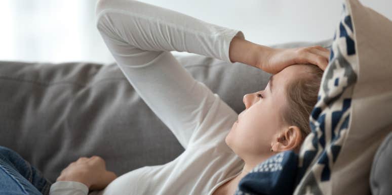 For Every New Mom Who Feels Like She's Completely Lost Herself woman with hand on head overwhelmed
