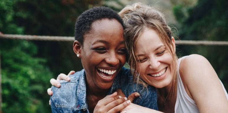 Why Forced Friendships Aren't Worth Your Time (& How To Avoid Them) female friends laughing together