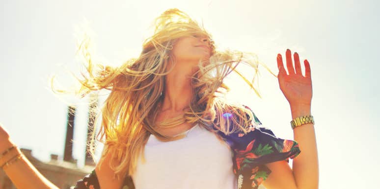 Free from shame and regret joyful woman in dun