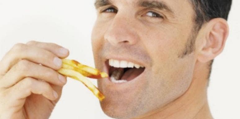 man eat fries man eating fries