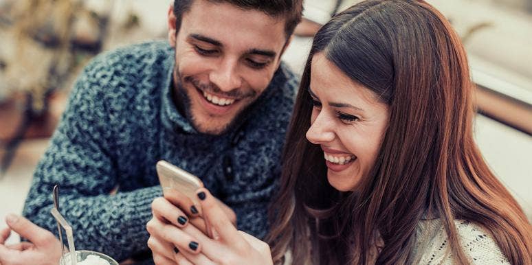 Wife Sends Funny Texts To Husband Of What He Says In His Sleep couple looking at the phone