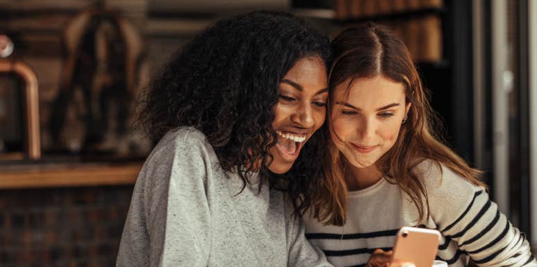 75 Funny Things To Ask Siri To Crack Yourself Up two girls laughing at phone