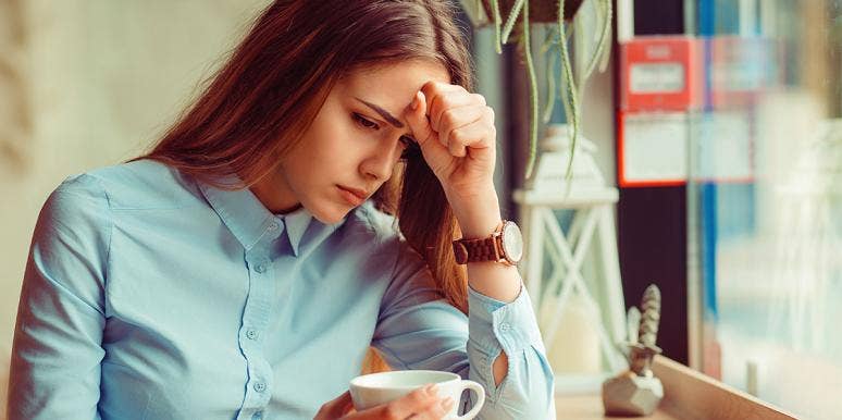 What Happened When I Gave Up Caffeine For A Year sad woman holding coffee
