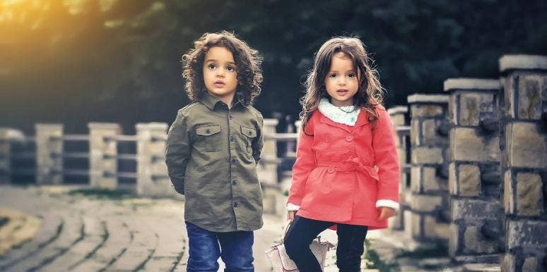 Boy and girl standing Boy and girl standing
