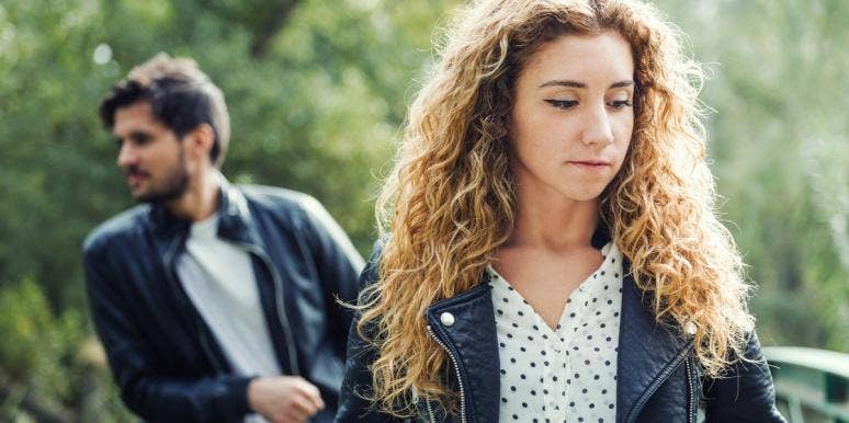 get over a narcissist sad looking woman with man behind her