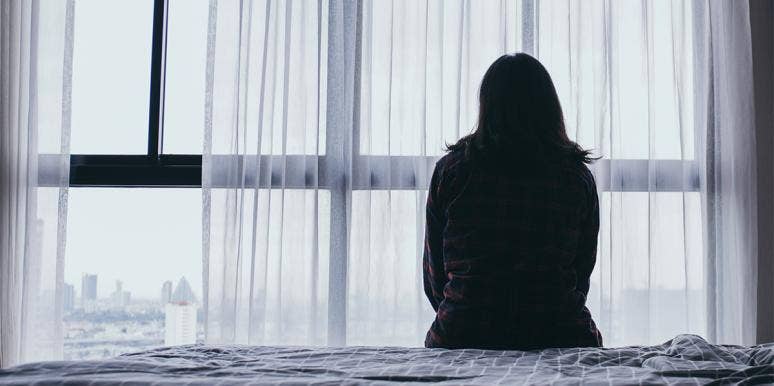 My Husband Ghosted Me — I Haven't Heard From Him In Months sad woman on bed