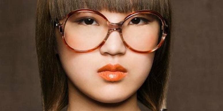 Got brains? asian woman with large glasses