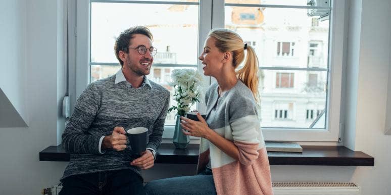good communication skills couple talking in front of window