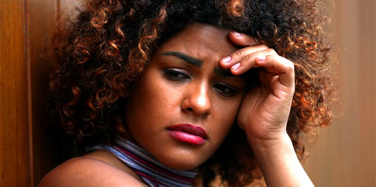 If You Have To Convince Yourself It's A Good Relationship, It's Not sad woman with hand on her face