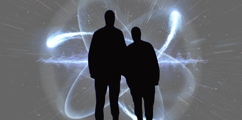 What Is Gravitational Time Dilation & Why Gravity Slows Down Time two people silhouette in space