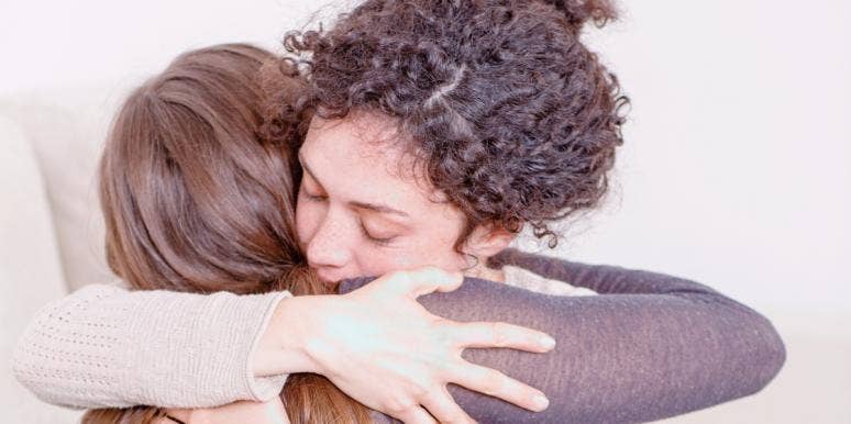 grief after suicide two women hugging