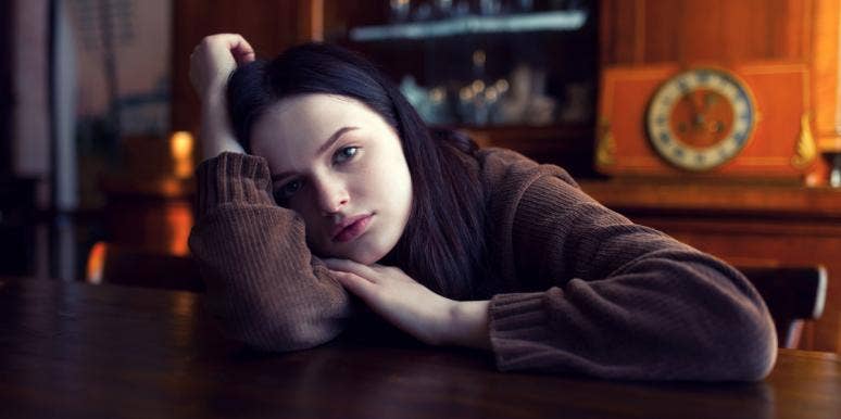 grief and the holidays unhappy woman in dark room