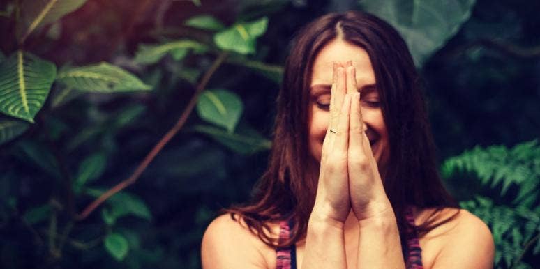 3 Grounding Techniques For Anxiety Woman doing grounding techniques for anxiety