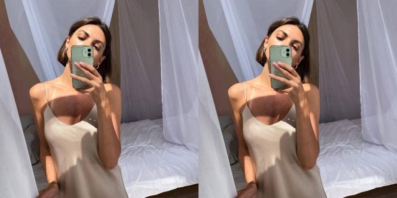 woman taking a mirror selfie