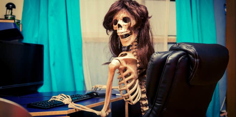 skeleton at computer posting Halloween memes