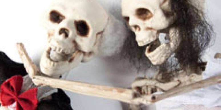 skeleton couple in tux and dress
