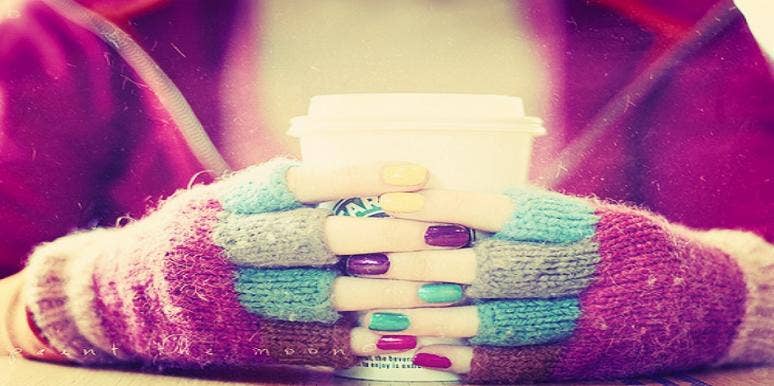 hands holding coffee hands holding coffee