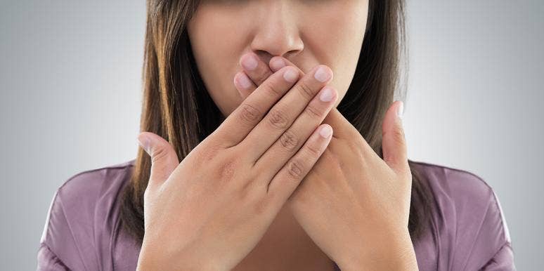 Why People Sniff Their Hands After Shaking Someone Else's woman surprised to learn people sniff their hands after shaking hands