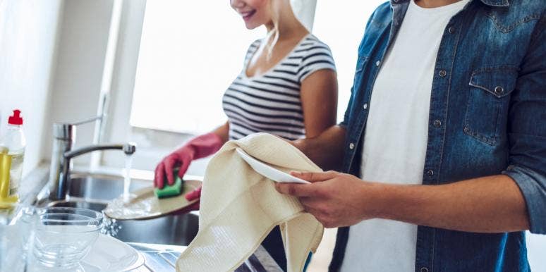 The Weird Reason Handwashing Your Dishes Can Make You A Happier Person couple washing dishes