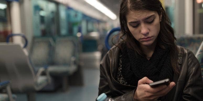 54 Unhappy Memes For Those With A Dark Sense of Humor unhappy woman looking at memes on phone