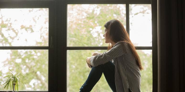 woman learning how to heal broken heart after a breakup woman learning how to heal broken heart after a breakup