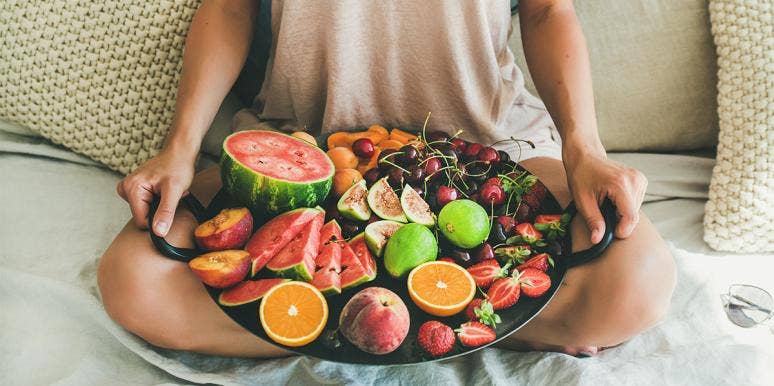 How An Extreme Health Fad Led To A Dangerous Unhealthy Obsession That Nearly Killed Me woman with fruit platter