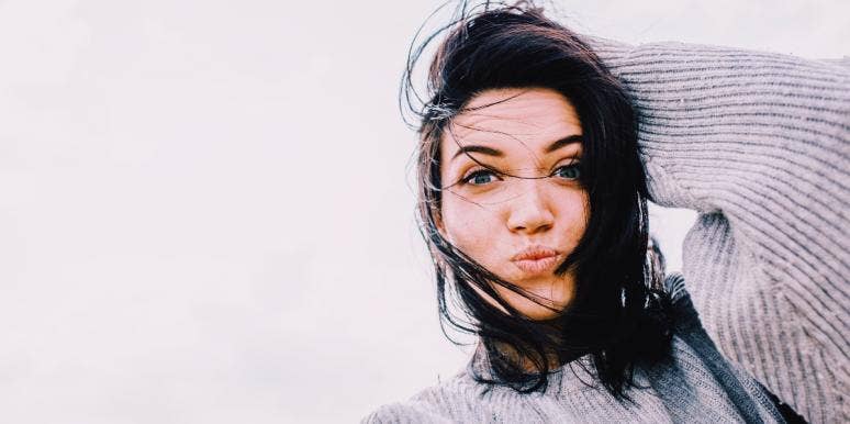 highly sensitive people dark-haired woman in a sweater