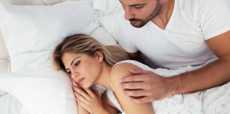 No Orgasms For Me: Antidepressants Totally Killed My Libido unhappy woman laying in bed with husband