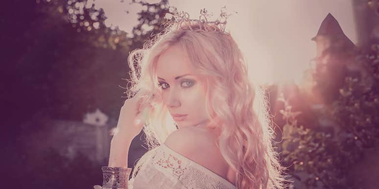 10 Reasons Every Man Should Date A Woman Who Thinks She's A Princess woman wearing crown looking back